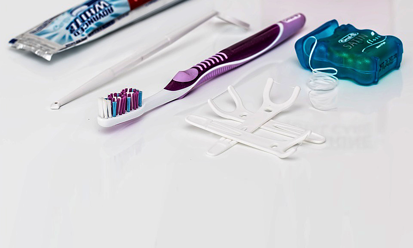 Professional dental cleaning and home-care kit illustration