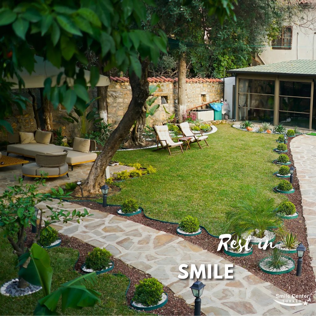 Garden path leading through greenery at Smile Center Turkey.