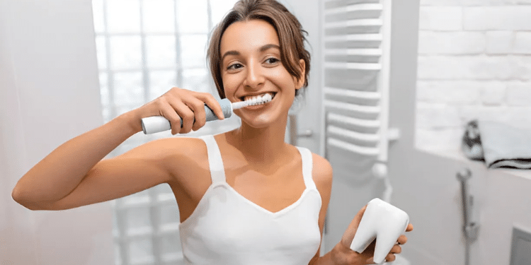 Correct tooth brushing technique with soft-bristle toothbrush