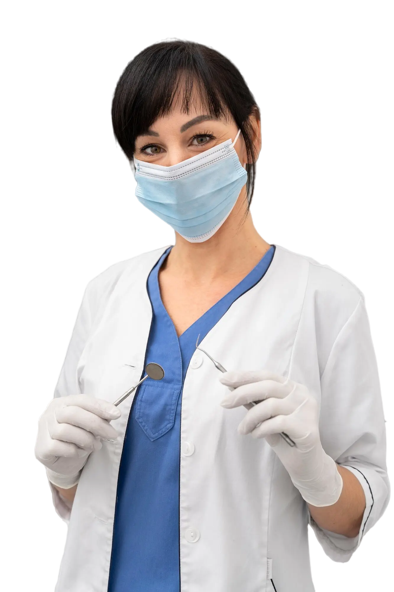 Smiling female dental professional wearing mask and gloves holding dental instruments – representing hygiene and expert care at Smile Center Turkey